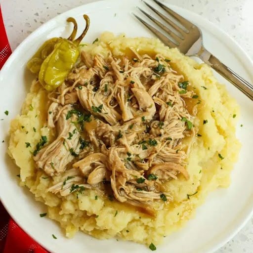 Tasty Mississippi Chicken is made easily in the crock pot with ranch seasoning, au jus mix, and pepperoncini peppers. This will quickly become your new favorite slow cooker recipe.

