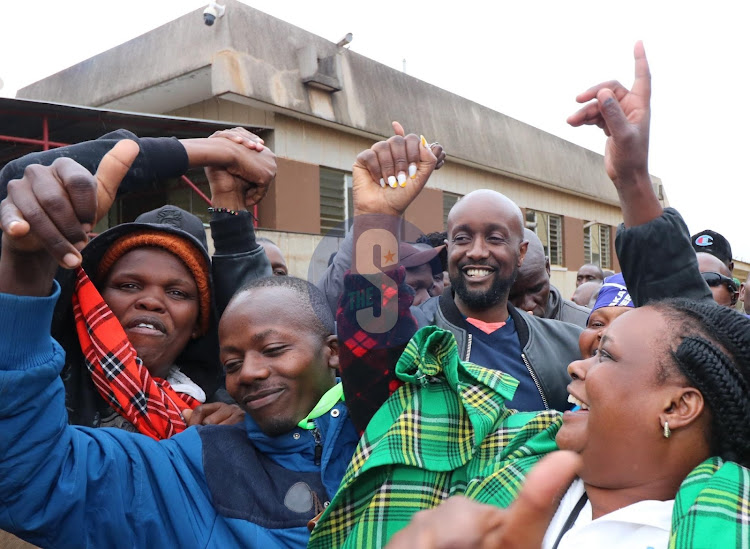 Former SportPesa Ronald Karauri is celebrated by his supporters after receiving his Kasarani MP-elect certificate at Kasarani tallying center on on August 11.