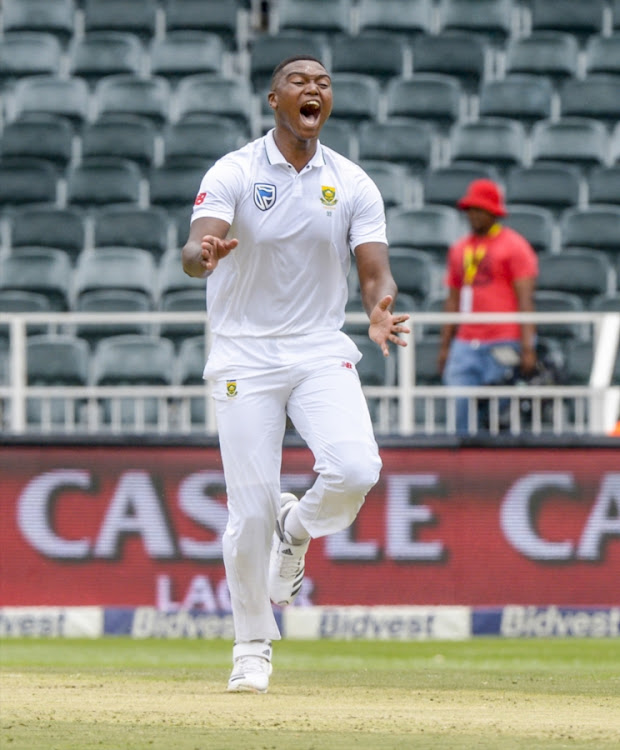 South Africa fast bowler Lungi Ngidi celebrates after taking a wicket during day 1 of the 3rd Sunfoil Test match against India at Bidvest Wanderers Stadium on January 24, 2018 in Johannesburg, South Africa. SA lead the three-match series 2-0.
