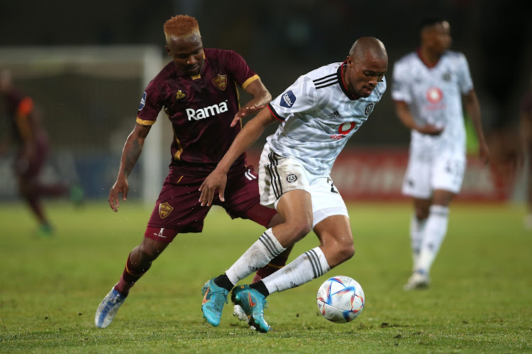 Molahlehi Solly Khunyedi of Stellenbosch challenges Goodman Mosele of Orlando Pirates during their DStv Premiership match at Danie Craven Stadium in Stellenbosch.