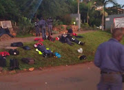 Traffic officers lying by the side of the road in Mpumalanga.