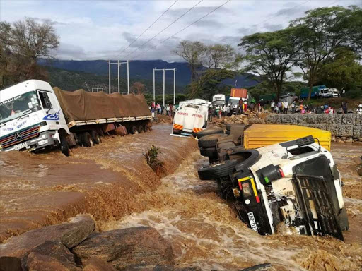 Two trailers swept away by river Turkwel at Kainuk on April 13th 2018/HESBOUN ETYANG