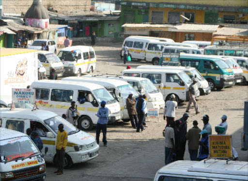 Matatu operators wait for customers at Kinangop bus stage in Naivasha