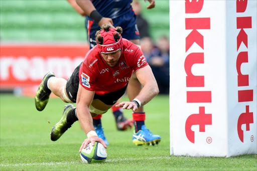 Lions' Warren Whiteley scores a try during the Super Rugby match between the Melbourne Rebels and Golden Lions at AAMI Park in Melbourne on May 6, 2017.