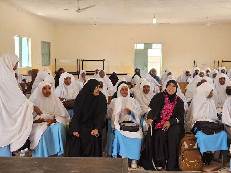 EALA MP Falhada Iman Dekow poses for a group photo with students of Ummu-Salama Girls Secondary School in Garissa town.