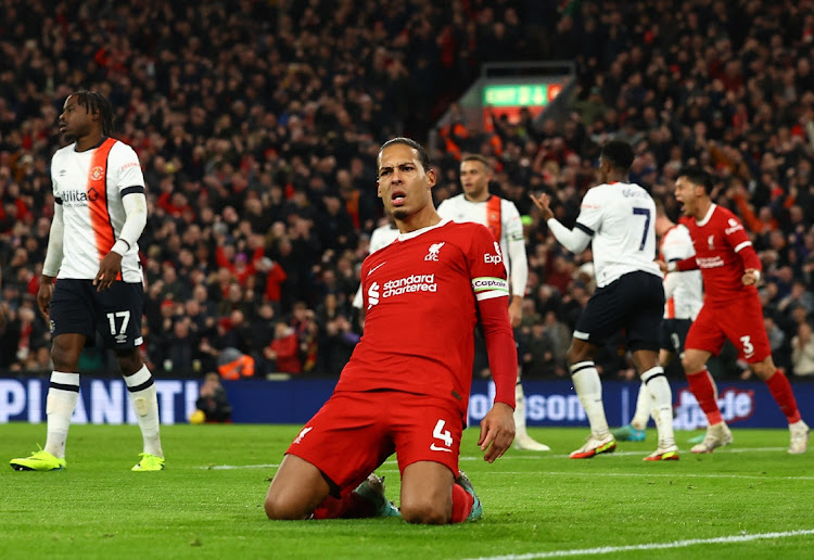 Liverpool's Virgil van Dijk celebrates scoring their first goal in their Premier League win against Luton Town at Anfield in Liverpool on Wednesday night.