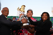 Pumas captain Willie Engelbrecht receives the Currie Cup trophy after they beat Griquas at Windhoek Draught Park in Kimberley on Saturday.
