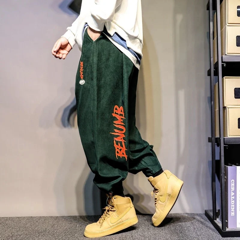 Pantalons de survêtement amples et décontractés pour adolescents et hommes, confortables et idéaux pour le quotidien, liberté de mouvement assurée.