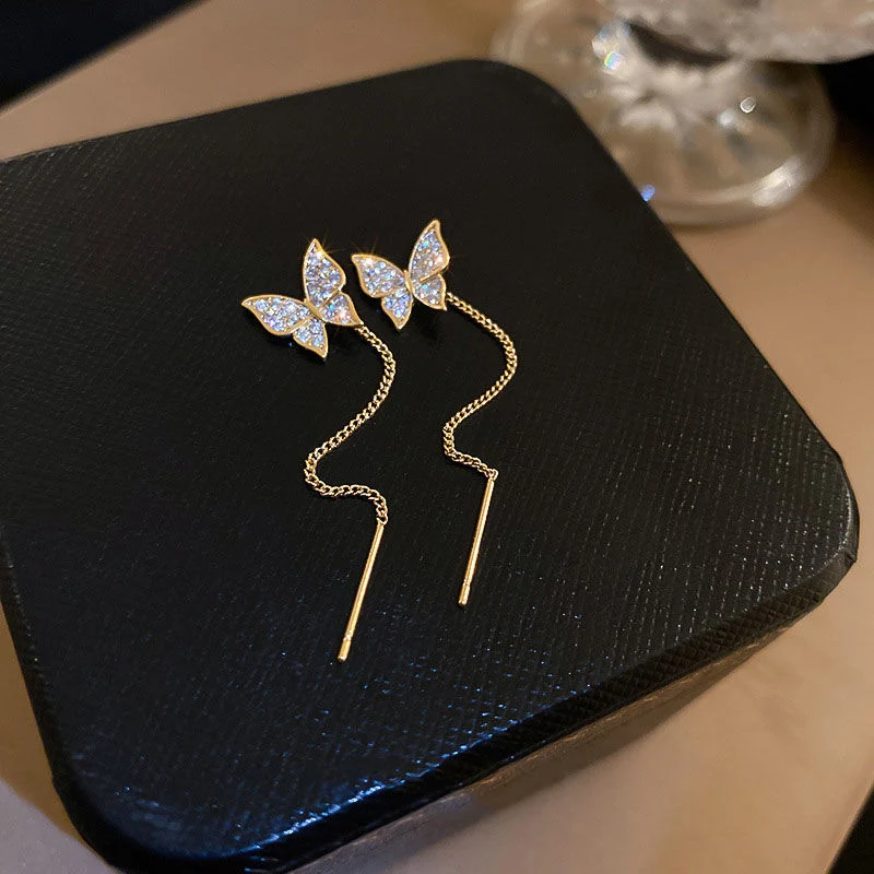 Pendientes mariposa con borlas largas de aguja de plata 925, elegantes y ligeros. Perfectos para cualquier ocasión, un toque de glamour.