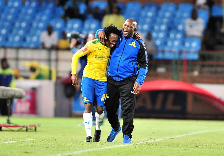 Percy Tau of Mamelodi Sundowns celebrates a goal with Pitso Mosimane, coach of Mamelodi Sundowns during the Absa Premiership 2017/18 football match between Mamelodi Sundowns and Maritzburg United at Loftus Stadium, Pretoria on 13 December 2017.