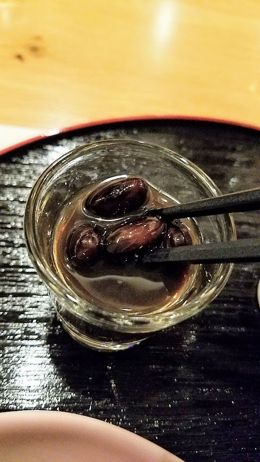 Dinner at Chef Naoko's Shizuku. I ordered the kaiseki, six courses that includes a catch of the day wild sashimi couse and choice of main dish with rice and miso soup. This is from the second course, which offered four small side dishes including this one of Kuromame sweet soybean