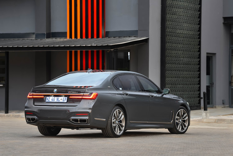 Quad exhaust tailpipes hint at the car's impressive performance.