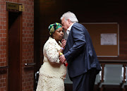 Dudu Myeni and businessman Louis Liebenberg at Pietermaritzburg high court on Monday, where Jacob Zuma is prosecuting state advocate Billy Downer and News24 journalist Karyn Maughan.