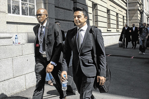 ON SIDE: Shrien Dewani's brother, Preyen, arrives back at the Cape Town High Court after a lunch break