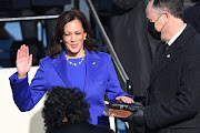 Social media users have pointed out that the purple outfit US Vice-President Kamala Harris wore to be sworn in is uncannily similar to one previously worn by cartoon character Lisa Simpson.