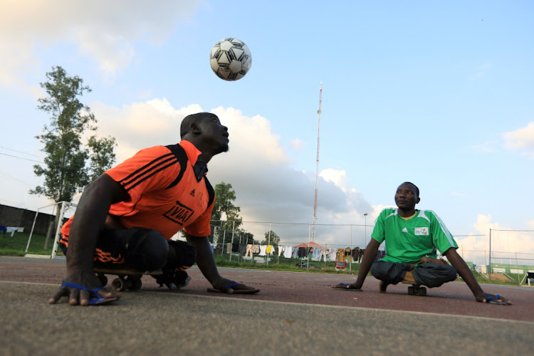 A victim of polio heads the ball during a game of soccer in Abuja, Nigeria, on August 22 2020. The world is at a 'dangerous moment' in the fight against diseases like polio, a senior WHO official has warned, as efforts begin to immunise 23-million children in five African countries after a case in Malawi. File photo.