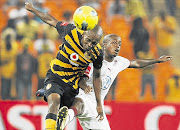 TOUGH CHALLENGE: Lawrence Molekwane of Kaizer Chiefs and Bennet Chenene of Moroka Swallows battle for the ball during their Premier Soccer League game last night Picture: SIMPHIWE NKWAL