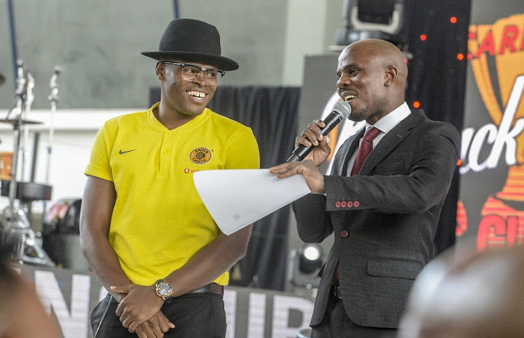 Thomas Mlambo of SABC Sport with Willard Katsande of Kaizer Chiefs during the Carling Black Label media launch at Park Station on May 28, 2019 in Johannesburg, South Africa.