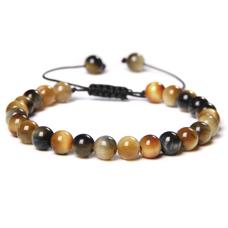 Bracciale in occhio di tigre naturale intrecciato per donna, un accessorio elegante e protettivo, perfetto per ogni occasione e look.