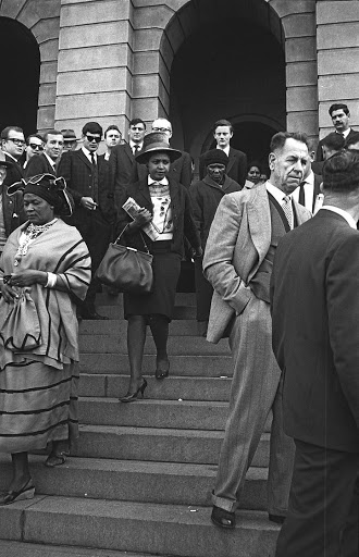 Albertina Sisulu, left, and Winnie Mandela leave the Palace of Justice during the Rivonia Trial in this shot by Alf Kumalo.