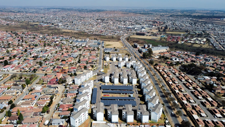 As SA's power crisis worsens, citizens are increasingly opting for renewal energy options. Here solar panels are seen next to housing units at the Palm Springs residential estate in Cosmo City, Joburg.