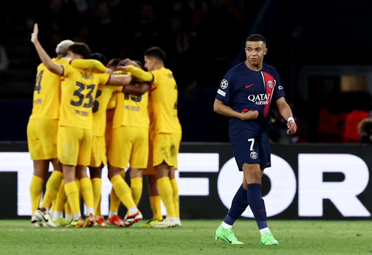 Paris St-Germain's Kylian Mbappé looks dejected after Andreas Christensen scores FC Barcelona's third goal in their Uefa Champions League quarterfinal first leg at Parc des Princes in Paris on Wednesday night.