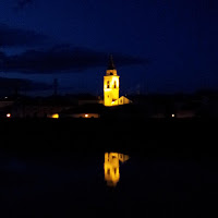 Riflessi notturni col fiume in piena di 