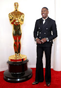 Colman Domingo poses on the red carpet during the Oscars arrivals at the 96th Academy Awards in Hollywood, Los Angeles. 