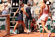 Marta Kostyuk of Ukraine walks past Aryna Sabalenka of Belarus without shaking hands after their first round match on day one of the French Open at Roland Garros on May 28 2023.