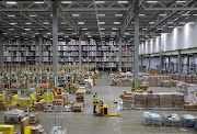 An employee operates a forklift at a warehouse of Russian retailer Lenta in Leningrad Region, Russia April 27, 2022. 