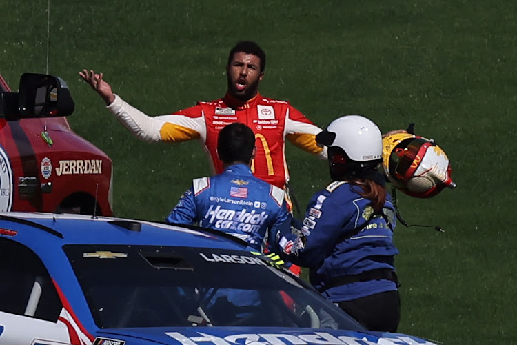 Bubba Wallace confronts Kyle Larson after an on-track incident during the NASCAR Cup Series South Point 400 at Las Vegas Motor Speedway on October 16 2022 in Nevada.