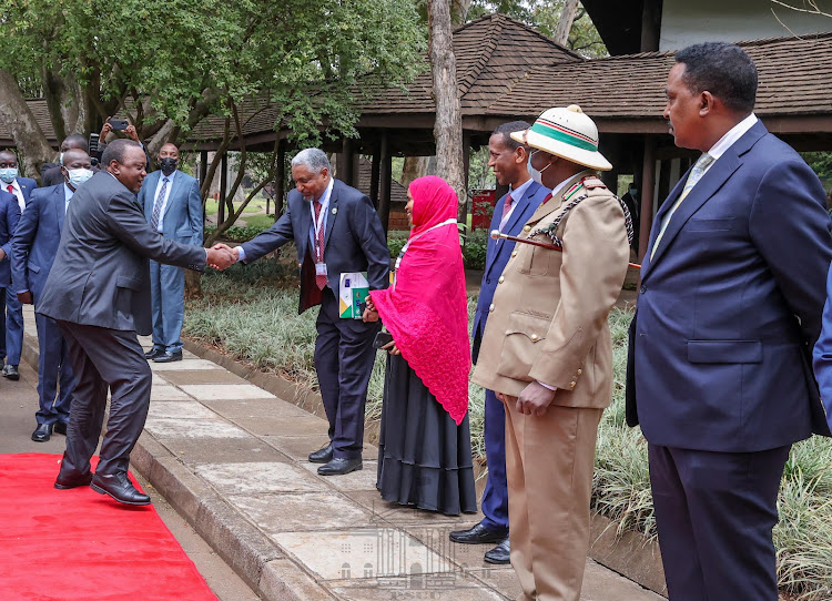 President Uhuru Kenyatta arrives at a Nairobi hotel for the 39th Extraordinary Assembly of IGAD Heads of State and Government Summit on July 5, 2022.