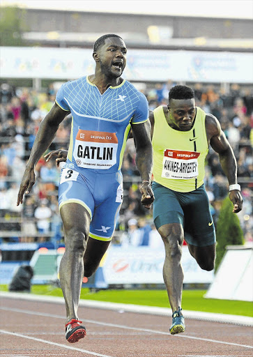 PUT FOOT: US sprinter Justin Gatlin, left, ran a world-leading time of 9.86sec to win the 100m in Ostrava on Tuesday night