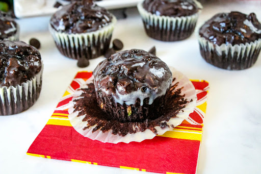 Dark Chocolate Zucchini Muffin With White Chocolate Ganache ready to be eaten.