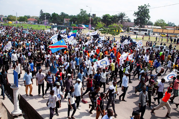 Supporters of opposition leader Martin Fayulu, demonstrate during the independence of the country’s electoral commission, in Kinshasa, Democratic Republic of Congo, on October 16 2021.