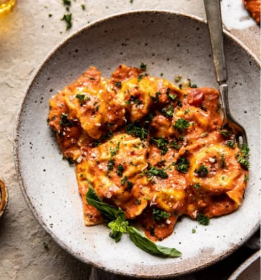 Chicken Ravioli In Creamy Tomato Basil Sauce