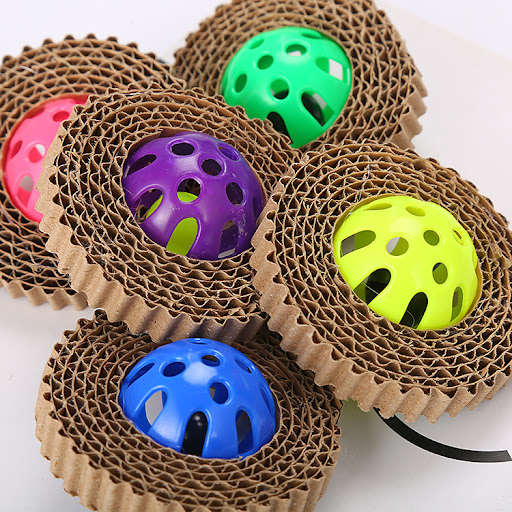 Title 5, Corrugated paper cat toy with plastic ball. Enc...