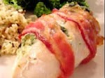 Stuffed and Wrapped Chicken Breast was pinched from <a href="http://allrecipes.com/Recipe/Stuffed-and-Wrapped-Chicken-Breast/Detail.aspx" target="_blank">allrecipes.com.</a>