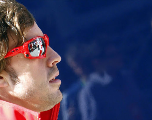 Ferrari Formula One driver Fernando Alonso of Spain arrives at the Hungaroring circuit near Budapest July 30, 2011