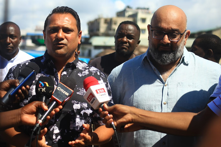 Mombasa Cement's Imtiaz Sayani and Tudor MCA Samir Bhaloo at the Makupa roundabout on Wednesday.