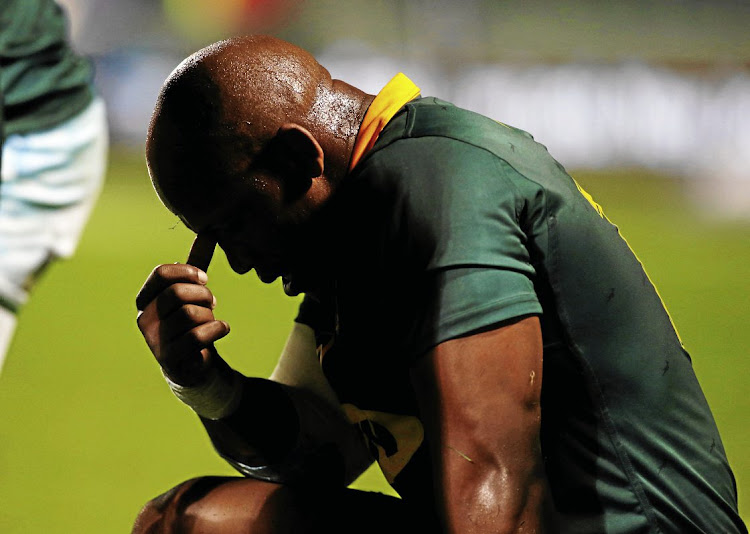 Springbok hooker Bongi Mbonambi's misery reflects the feelings of South African fans after the All Blacks demolished the Boks 57-0 yesterday - South Africa's worst defeat in 111 years of playing rugby.