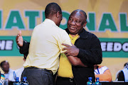 Paul Mashatile, ANC deputy president, embraces president Cyril Ramaphosa on day four of the ruling party's 55th national elective conference in Johannesburg.