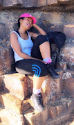 UCT vice-chancellor Mamokgethi Phakeng takes a break while walking up Table Mountain with the Bantu Hikers on March 9 2019. 