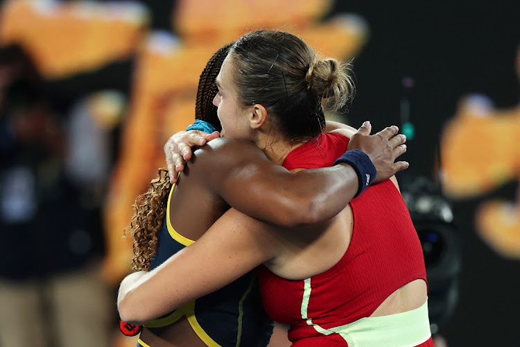 Aryna Sabalenka (right) embraces Coco Gauff after winning her semifinal singles match during the 2024 Australian Open at Melbourne Park on January 25 2024 in Melbourne.