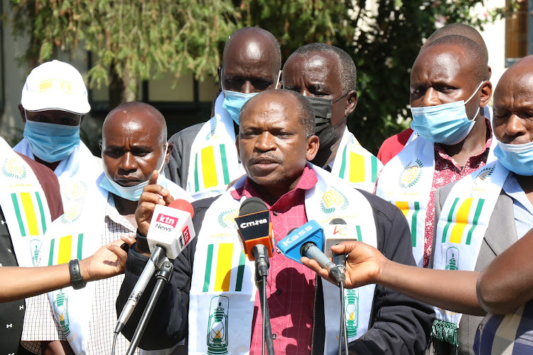 Democratic Party Nakuru Branch chairman, Njoroge Waititu addresses the media in Nakuru on December 7, 2021.