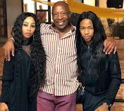 Khanyi Mbau with her dad, Menzi and her brother Lasizwe. 