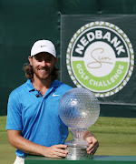 Tommy Fleetwood poses for a photo with the Nedbank Golf Challenge Trophy after victory during the fourth round of the Nedbank Golf Challenge hosted by Gary Player at the Gary Player CC on November 17, 2019 in Sun City, South Africa. 