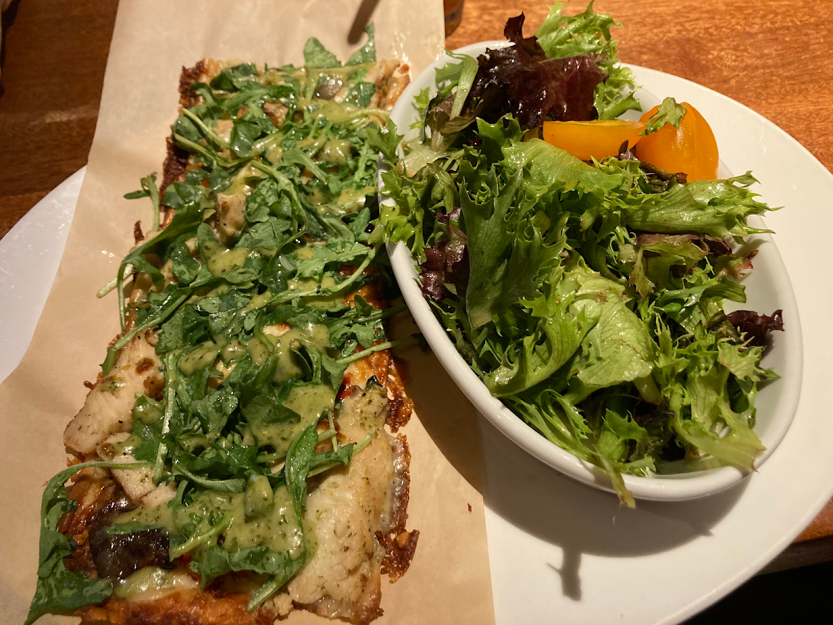 Pesto chicken flatbread with field greens salad