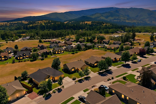 Residential neighborhood with mountains in background - Buy this luxury house in Lolo, 5 bedrooms