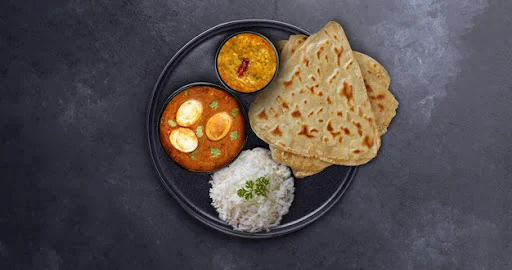 Egg Curry - Paratha & Rice Thali